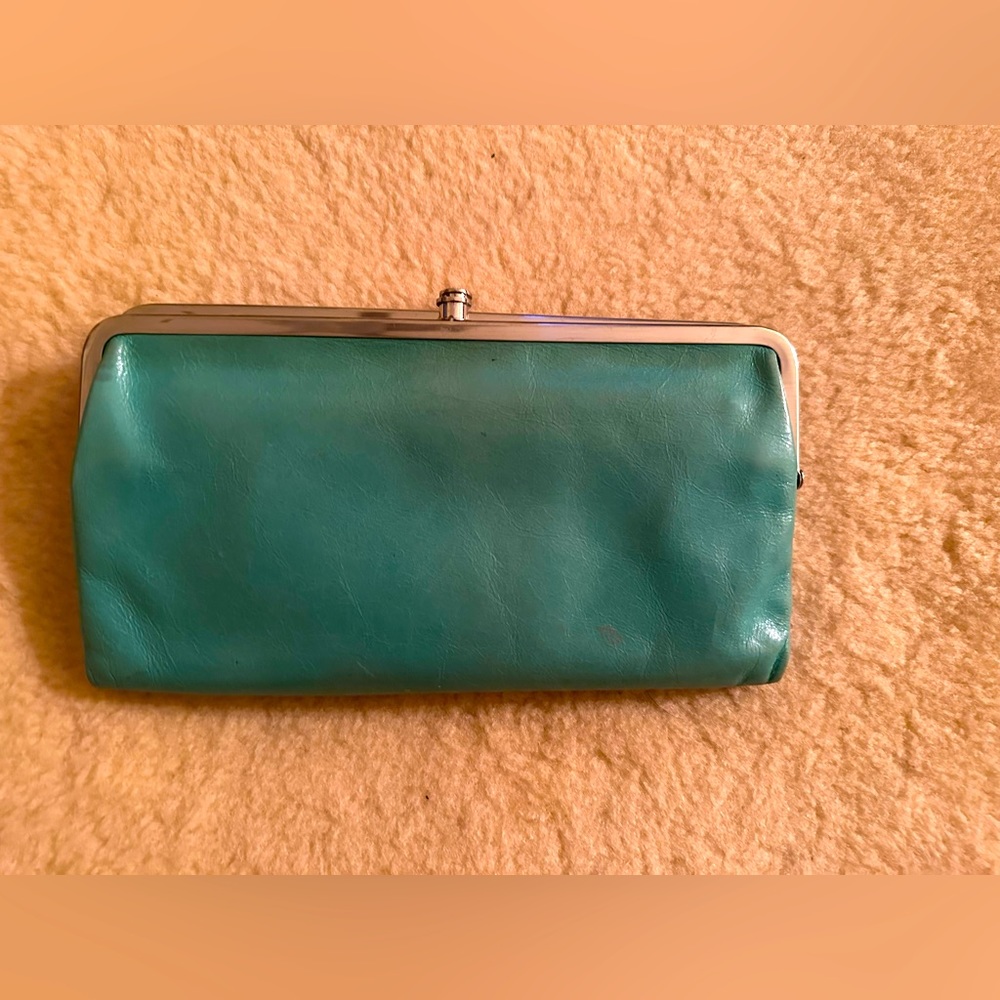 Hobo clutch green leather.